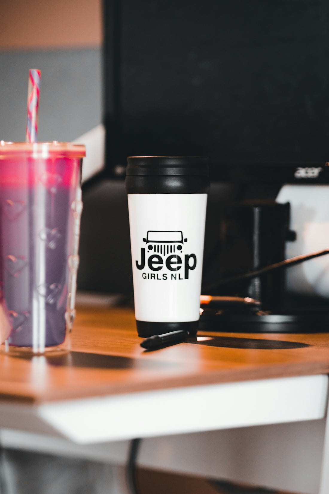 a couple of cups sitting on top of a table